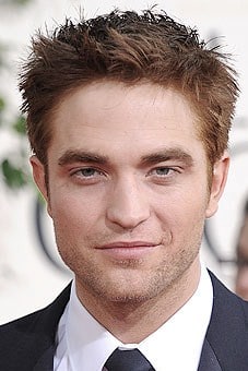 http://stylenews.peoplestylewatch.com/2011/01/17/robert-pattinson-shows-off-new-red-hair-at-golden-globes/