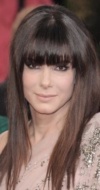 http://www.look.co.uk/pictures/celebrity-hairstyle-trend-fringes/sandra-bullock-wows-at-the-golden-globe-awards-with-a-fie