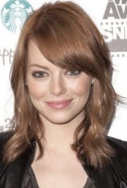 http://www.toofab.com/2011/06/03/emma-stone-goes-back-to-being-a-redhead/