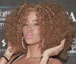 http://www.celebuzz.com/2011-07-05/amber-roses-curly-red-hair-yay-or-nay/