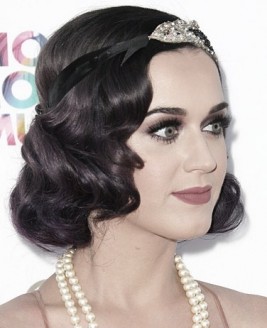 http://www.usmagazine.com/celebrity-beauty/news/katy-perrys-retro-hairstyle-love-it-or-hate-it-2012137 
