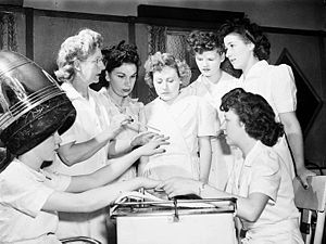 Ex-servicewomen learning manicure techniques d...